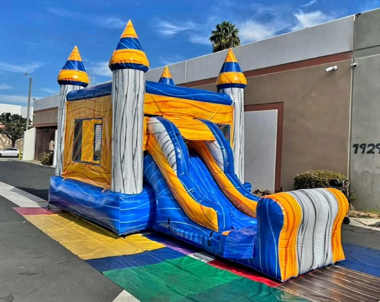 Silver bounce house with slide